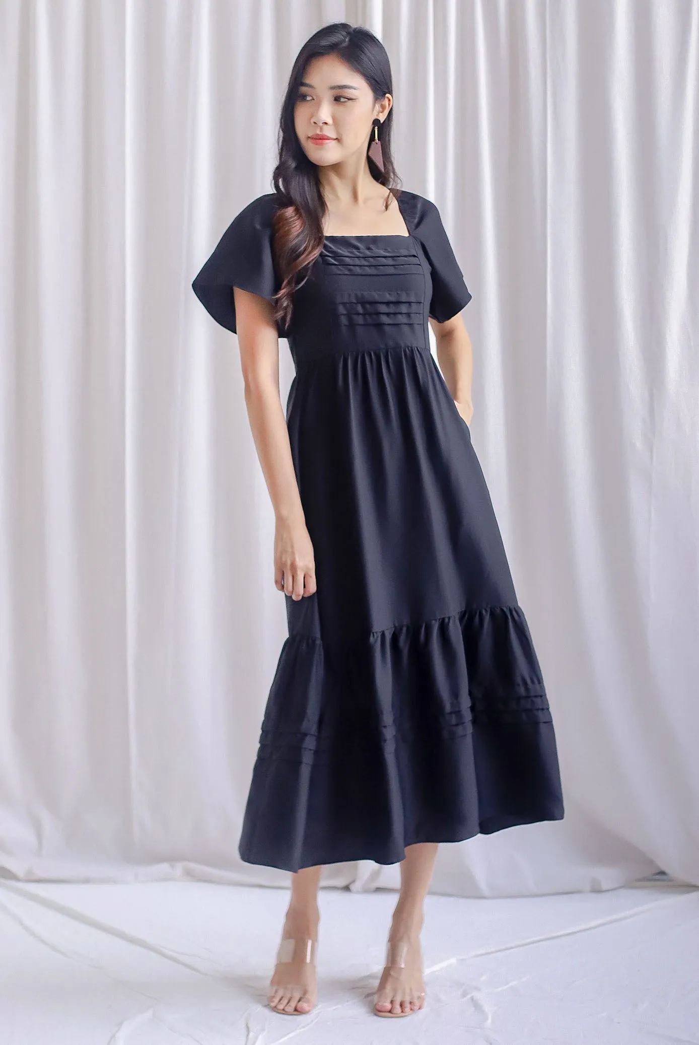 Bevelia Flutter Sleeve Pleated Maxi Dress In Black