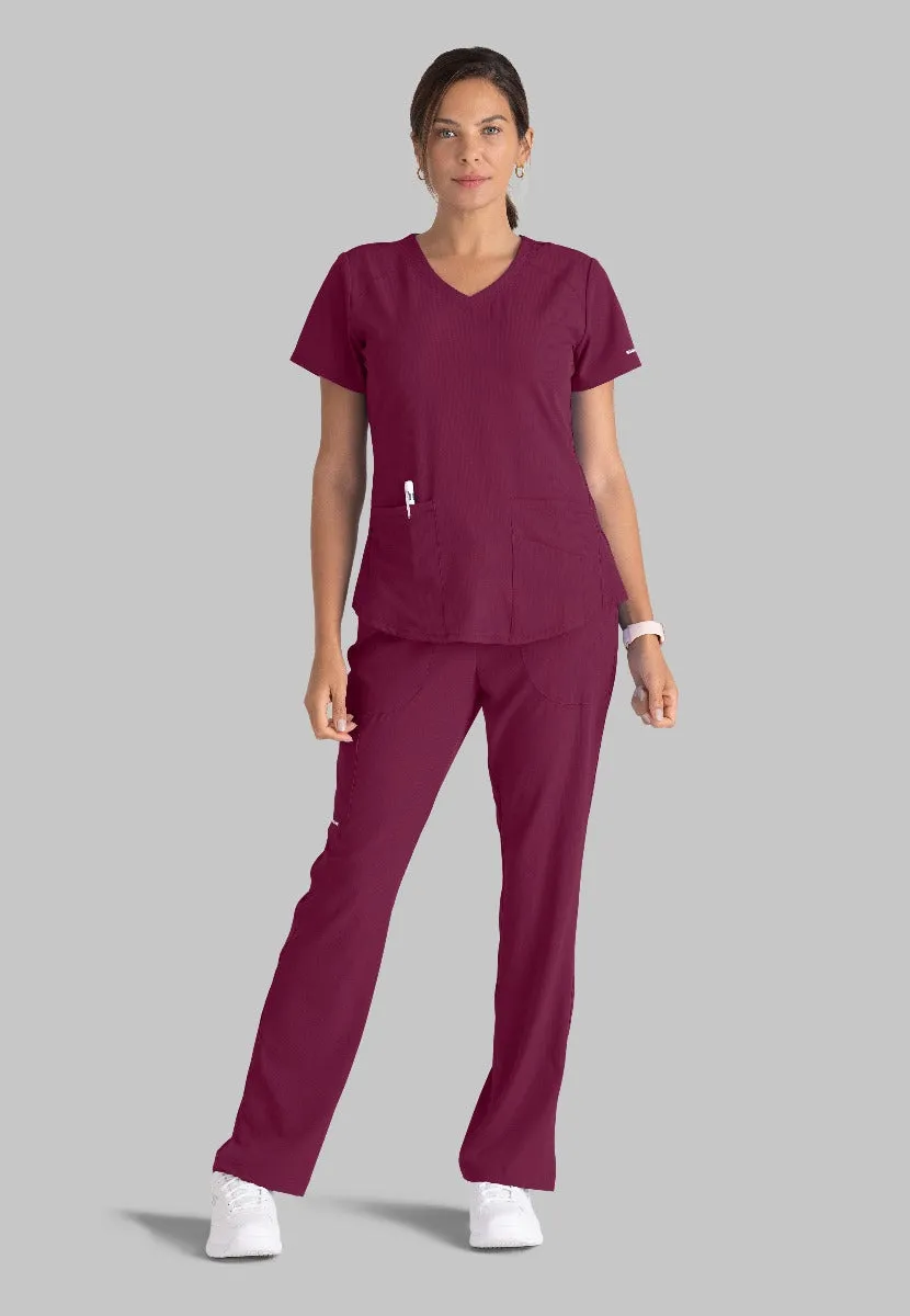 SKECHERS BREEZE 3-POCKET SHAPED HEM TOP