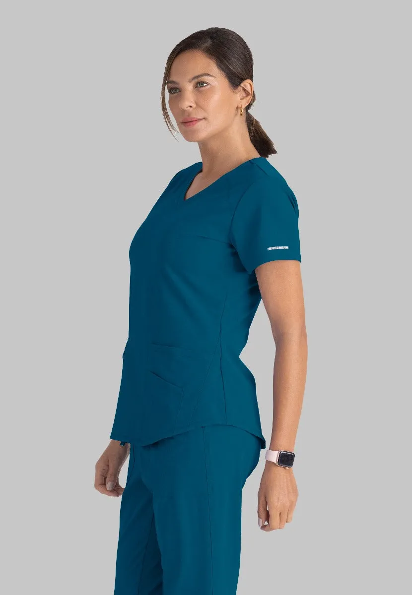 SKECHERS BREEZE 3-POCKET SHAPED HEM TOP