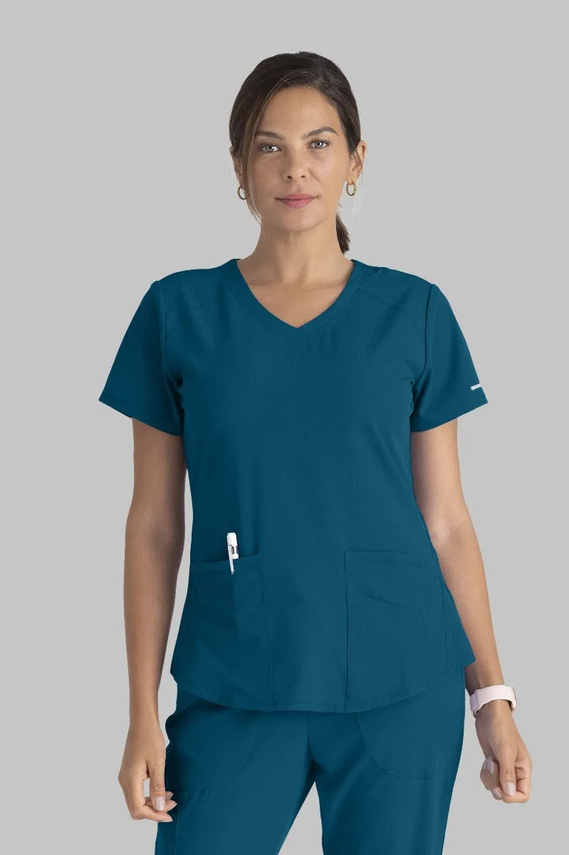 SKECHERS BREEZE 3-POCKET SHAPED HEM TOP