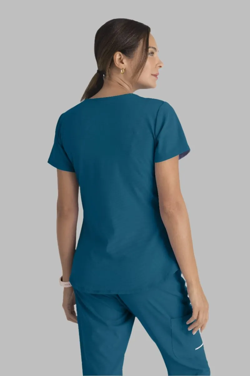 SKECHERS BREEZE 3-POCKET SHAPED HEM TOP